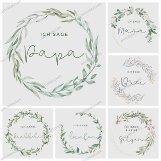 Meilensteinkarten Babys erstes Jahr von Naturmacher. Collage mit sechs Karten, die von zarten Aquarell-Blumenkränzen umrah...