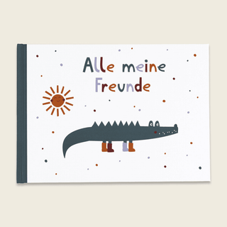 Freundebuch "Alle meine Freunde" von Ava&Yves mit Illustration: Krokodil mit Stiefeln, Sonne und Konfetti. Umweltfreundlic...