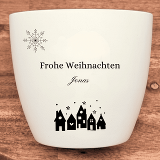 Weißer Blumentopf mit Gravur "Frohe Weihnachten Jonas", Schneeflocke und Winterdorf-Motiv. Weihnachtsgeschenk von Natur Ma...