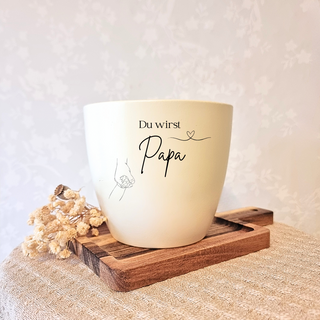 Begeisternder Blumentopf mit "Du wirst Papa" und Händchen-Motiv, perfektes Geschenk zur Schwangerschaft.