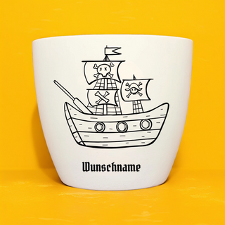 Weißer Blumentopf mit Piratenschiff-Motiv und "Wunschname" für das Naturmacher Pflanz-Set.