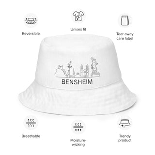 Wendbarer Bensheim Fischerhut von Naturmacher, unisex, atmungsaktiv, feuchtigkeitsableitend, mit Stadtsilhouette.