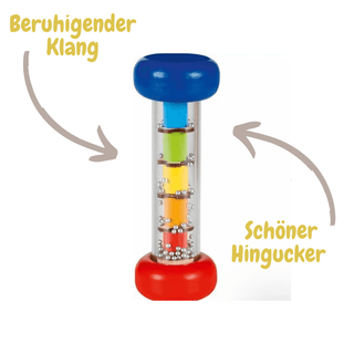 Goki Regenstab-Babyspielzeug mit bunten Kammern und silbernen Kügelchen für beruhigenden Klang.